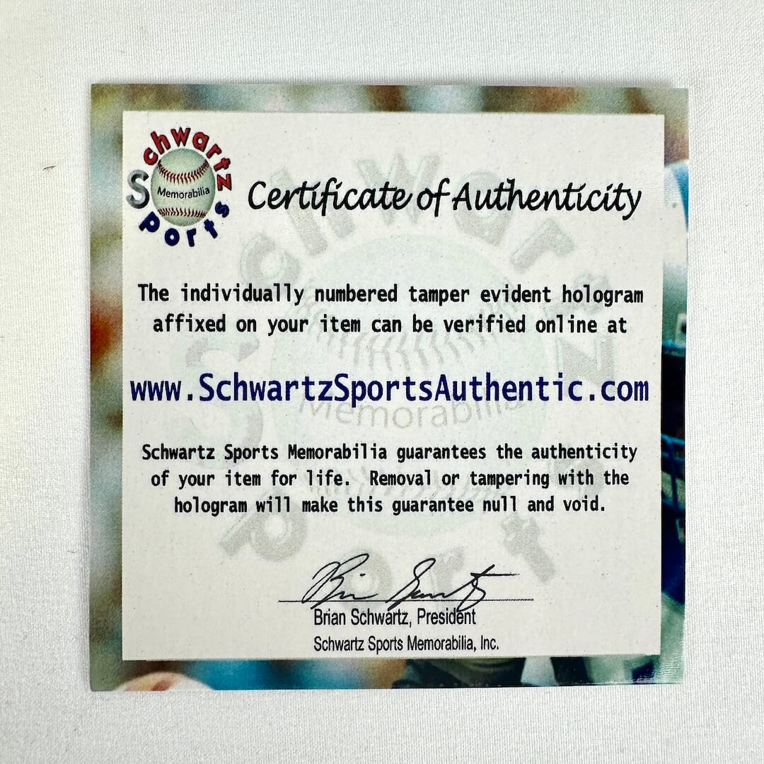 Certificate of Authenticity from Schwartz Sports Memorabilia on a textured background