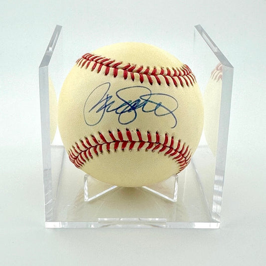 Signed baseball in a clear display case on a white background