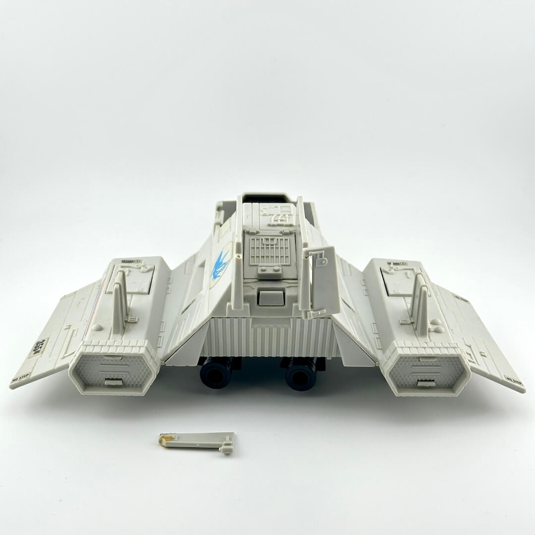 Toy model of a spaceship on a white background