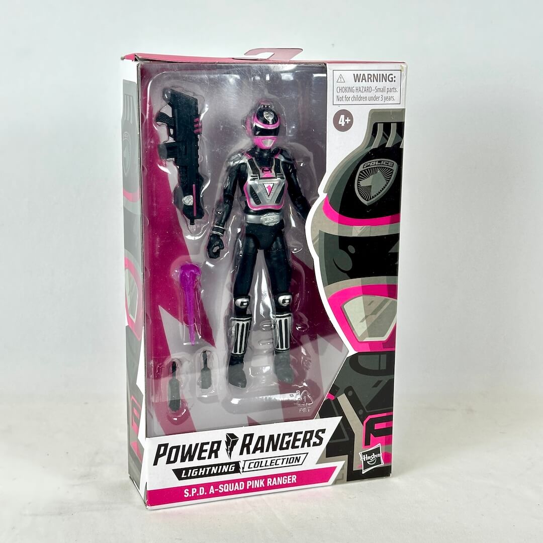 Power Rangers character in black and pink in original retail packaging, photographed on white background. 