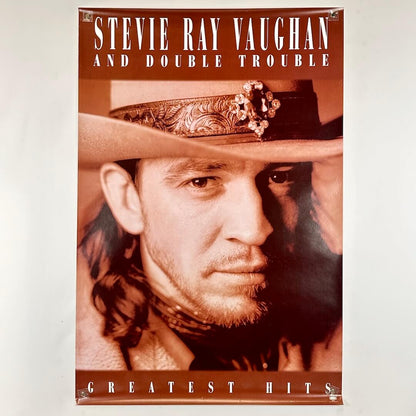 Poster of Stevie Ray Vaughan and Double Trouble with a cowboy hat
