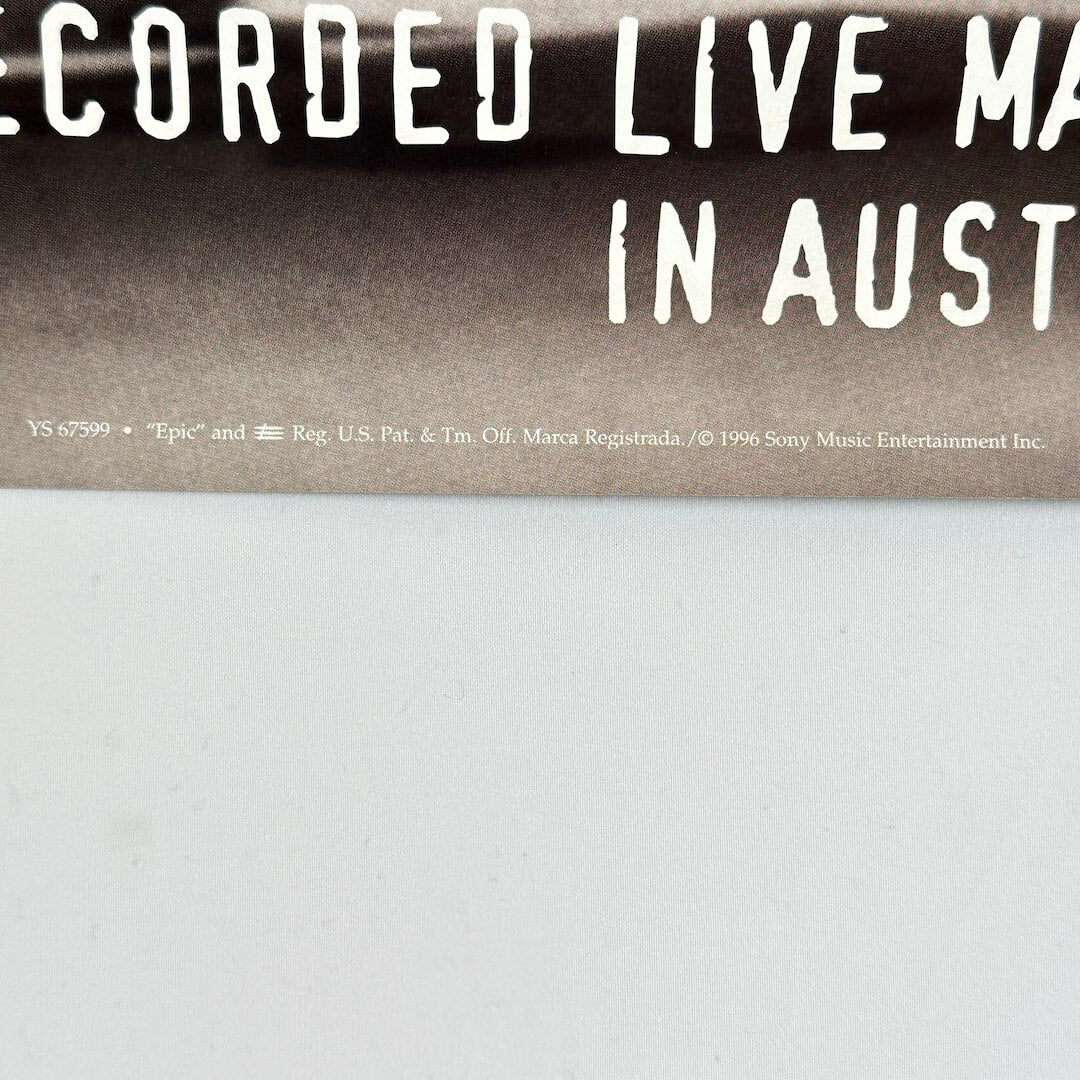 Bottom center of poster showing promo and copyright information. 