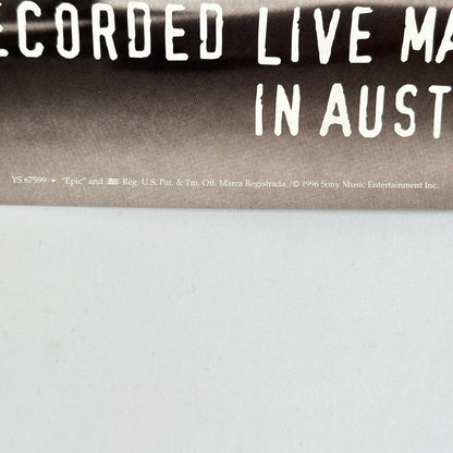 Bottom center of poster showing promo and copyright information. 