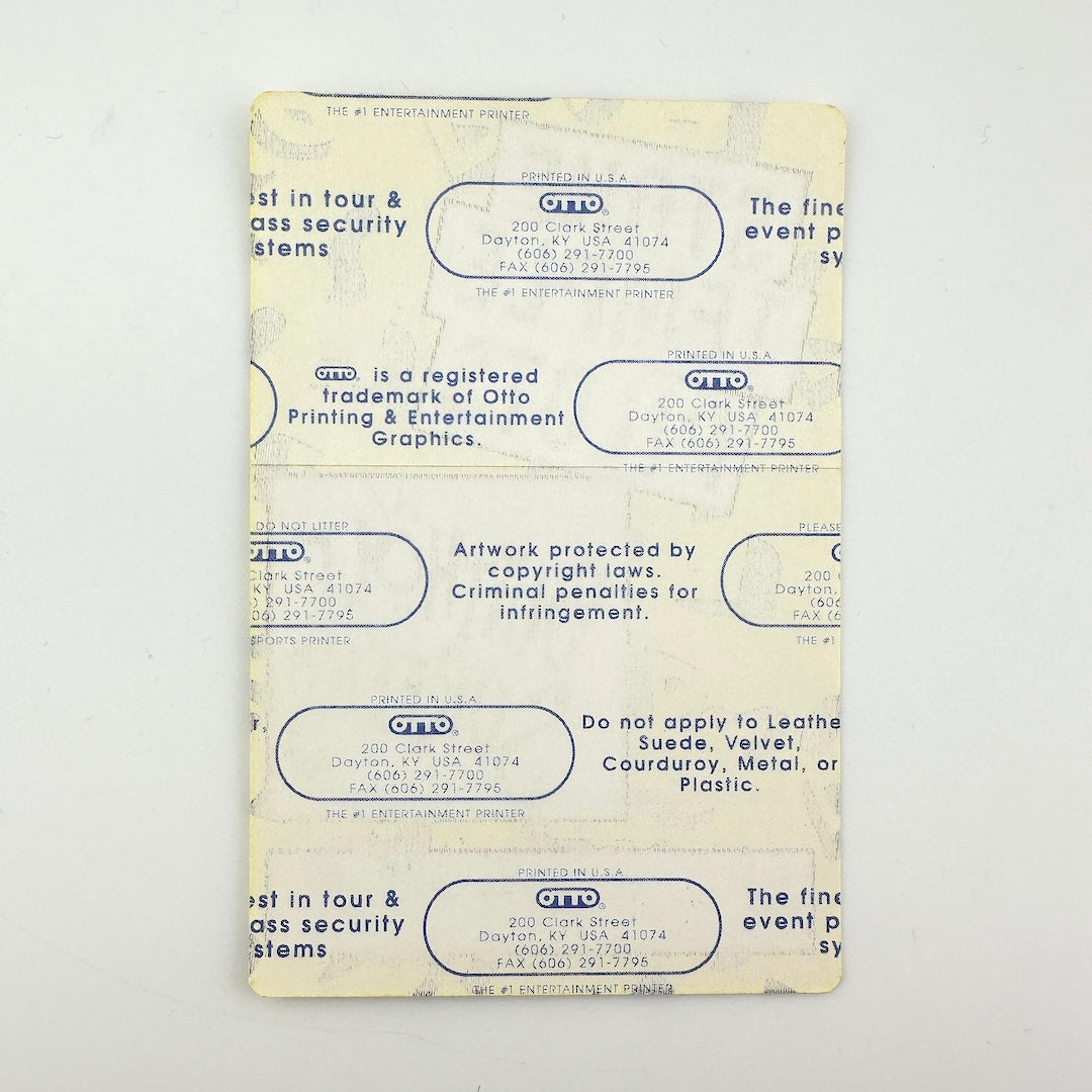 Backside of pass showing intact paper backing and mint condition. 