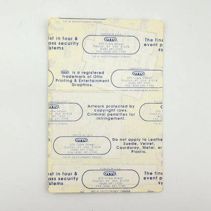 Backside of pass showing intact paper backing and mint condition. 