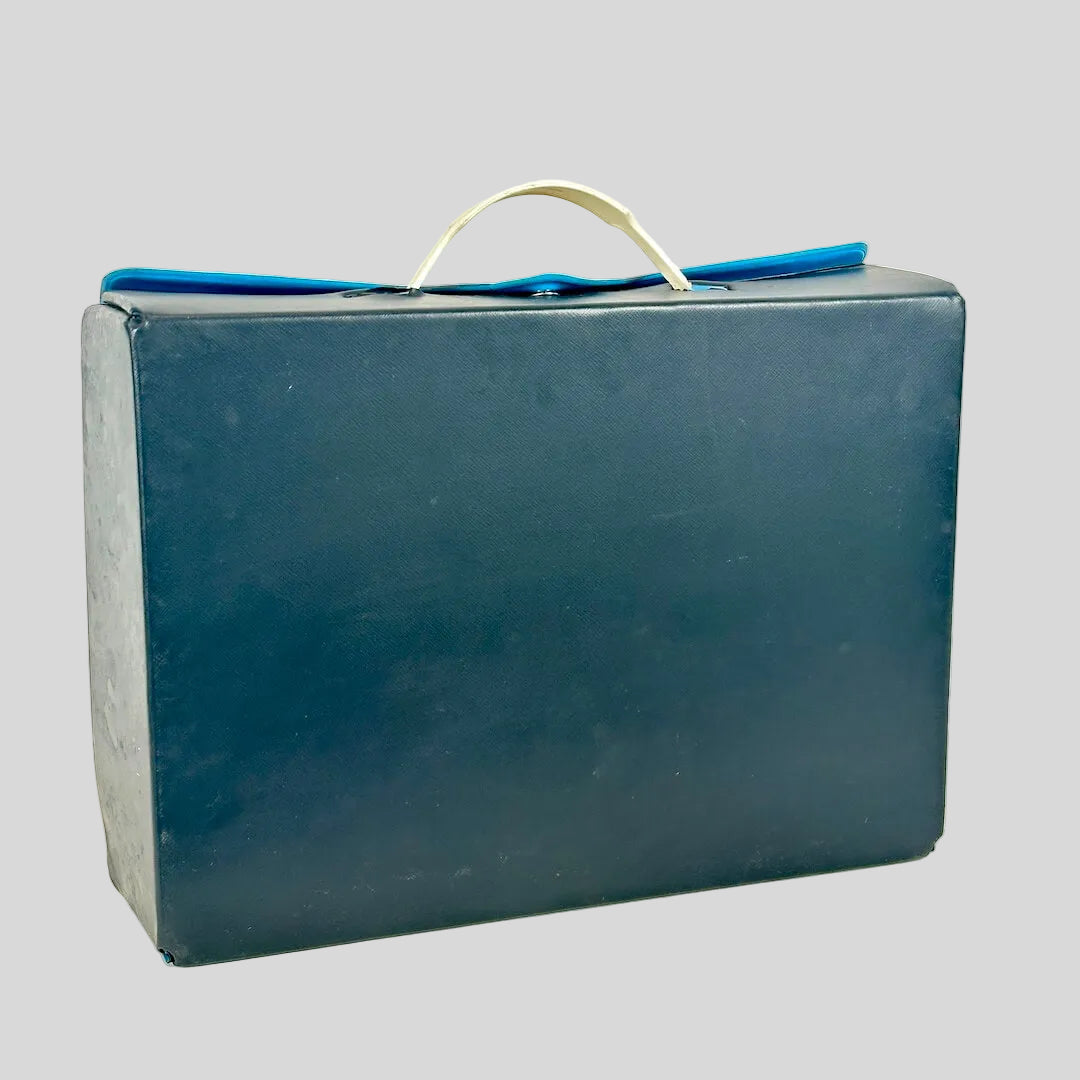 Blue rectangular box with a handle on a white background