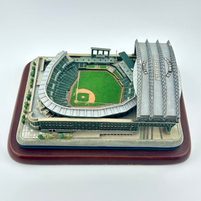 Model of a baseball stadium on a wooden base with a white background