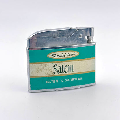 A vintage Salem filter cigarette lighter with a teal and cream label and a metallic silver body.