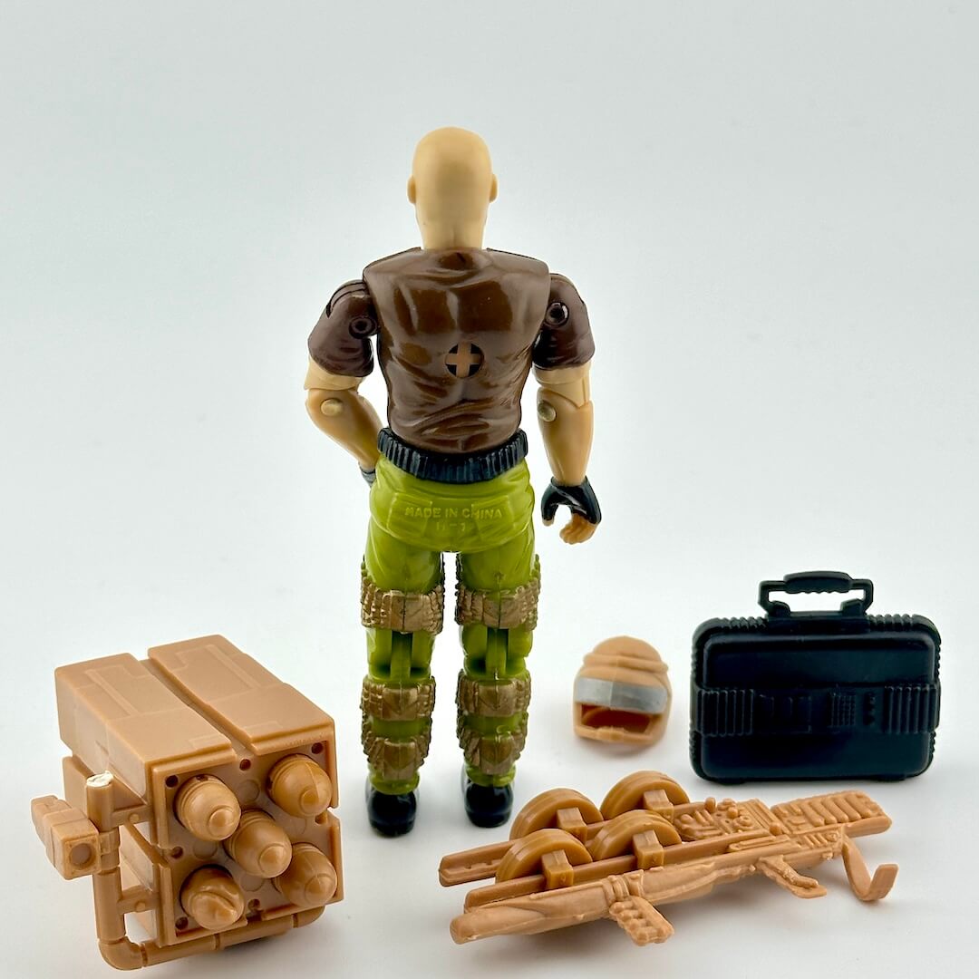 Toy figure with accessories on a white background
