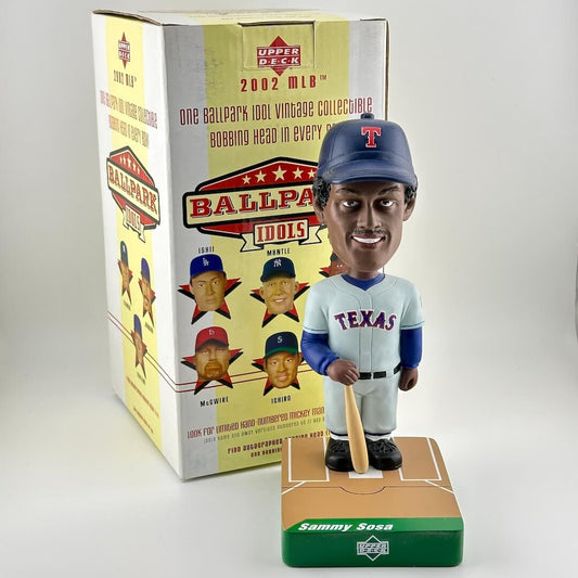 Bobblehead figure of a baseball player in front of its packaging