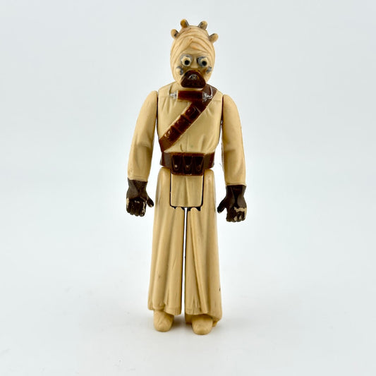 Action figure of a character from a science fiction franchise on a white background
