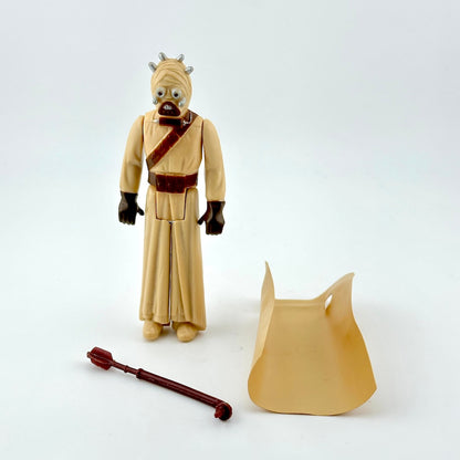 Action figure of a character from a science fiction franchise on a white background