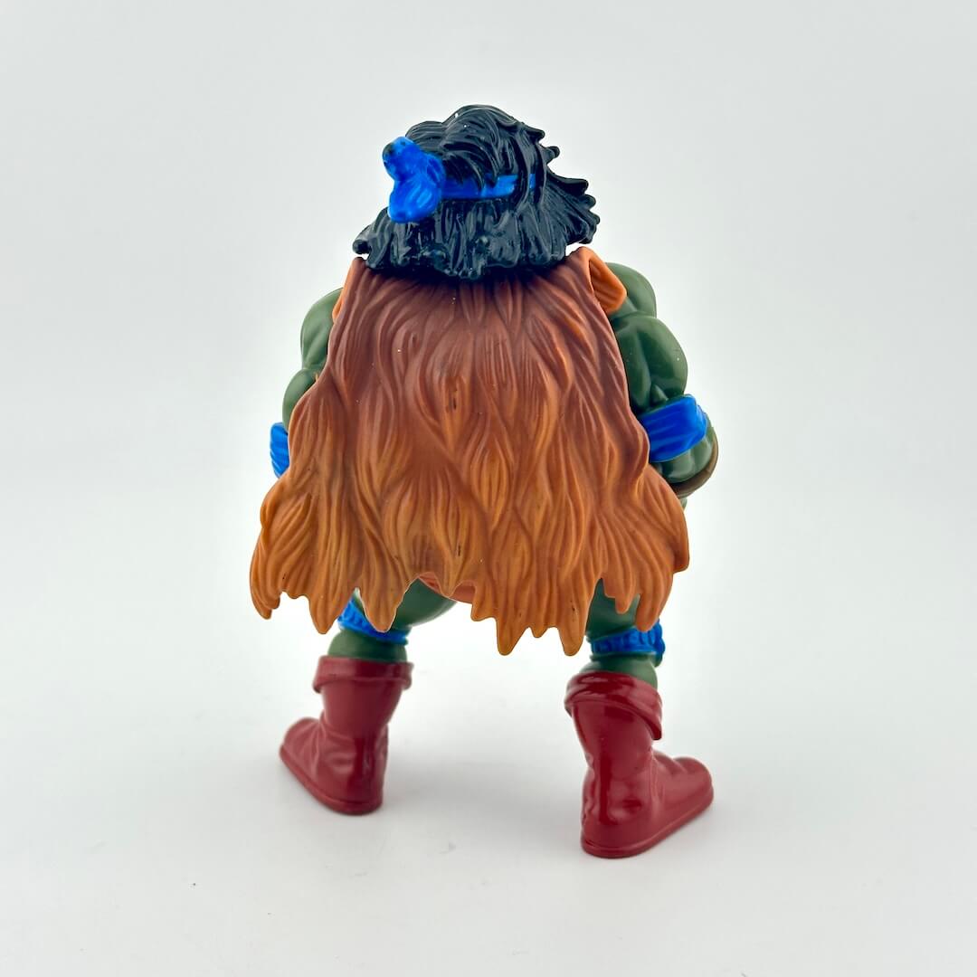 Toy figure with a beard and blue accents on a white background