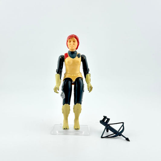 GI Joe action figure with an accessory against white background. 