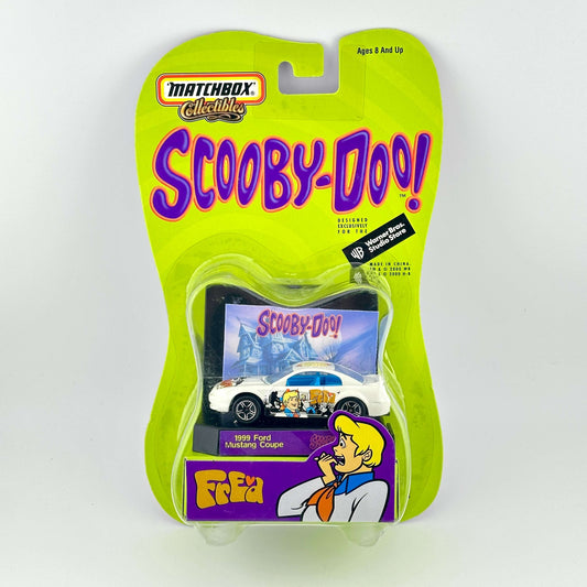 Scooby-Doo! Matchbox diecast car in original retail packaging with lime green and purple card back. 