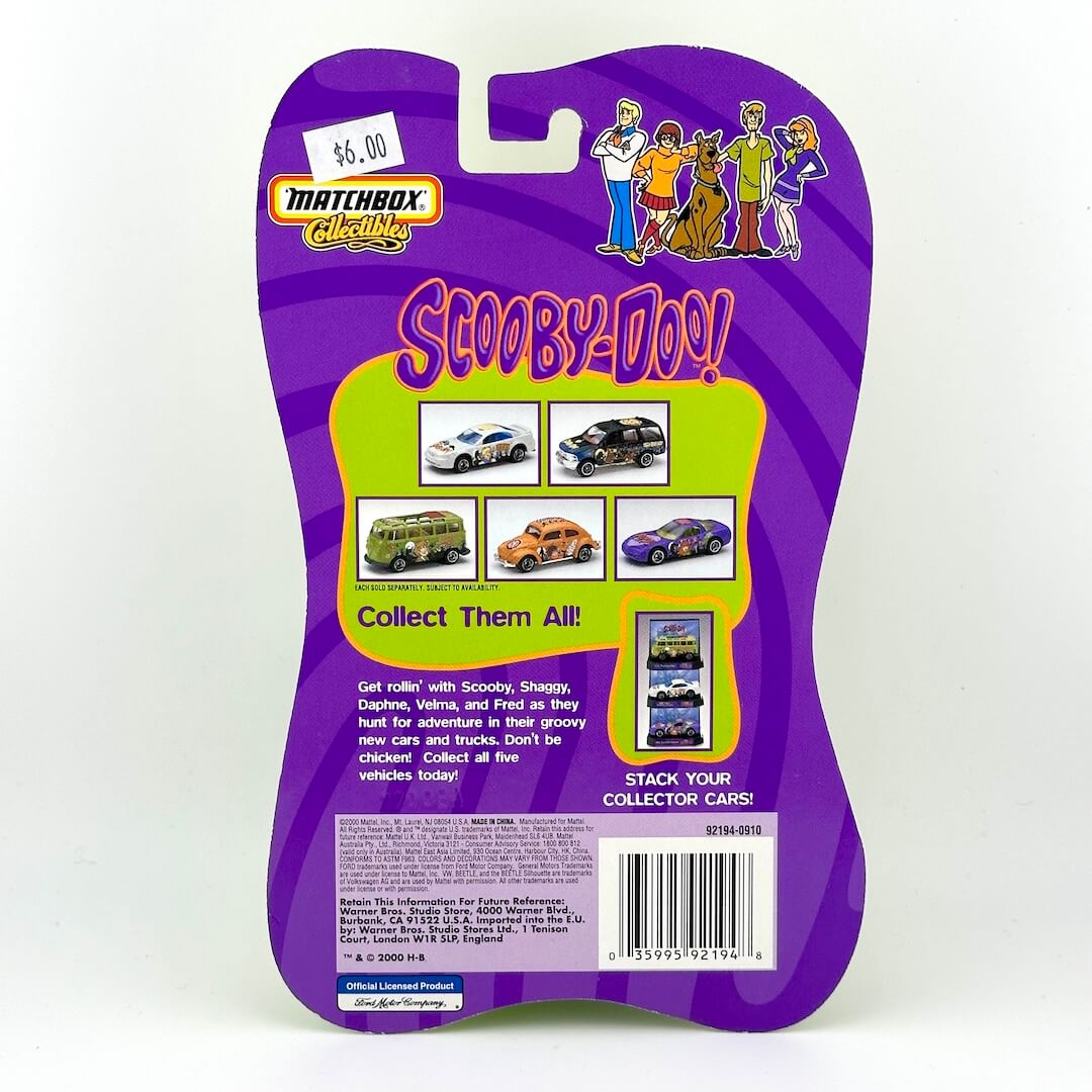 Back of a Matchbox Collectible Scooby-Doo toy blister card package showing product images.