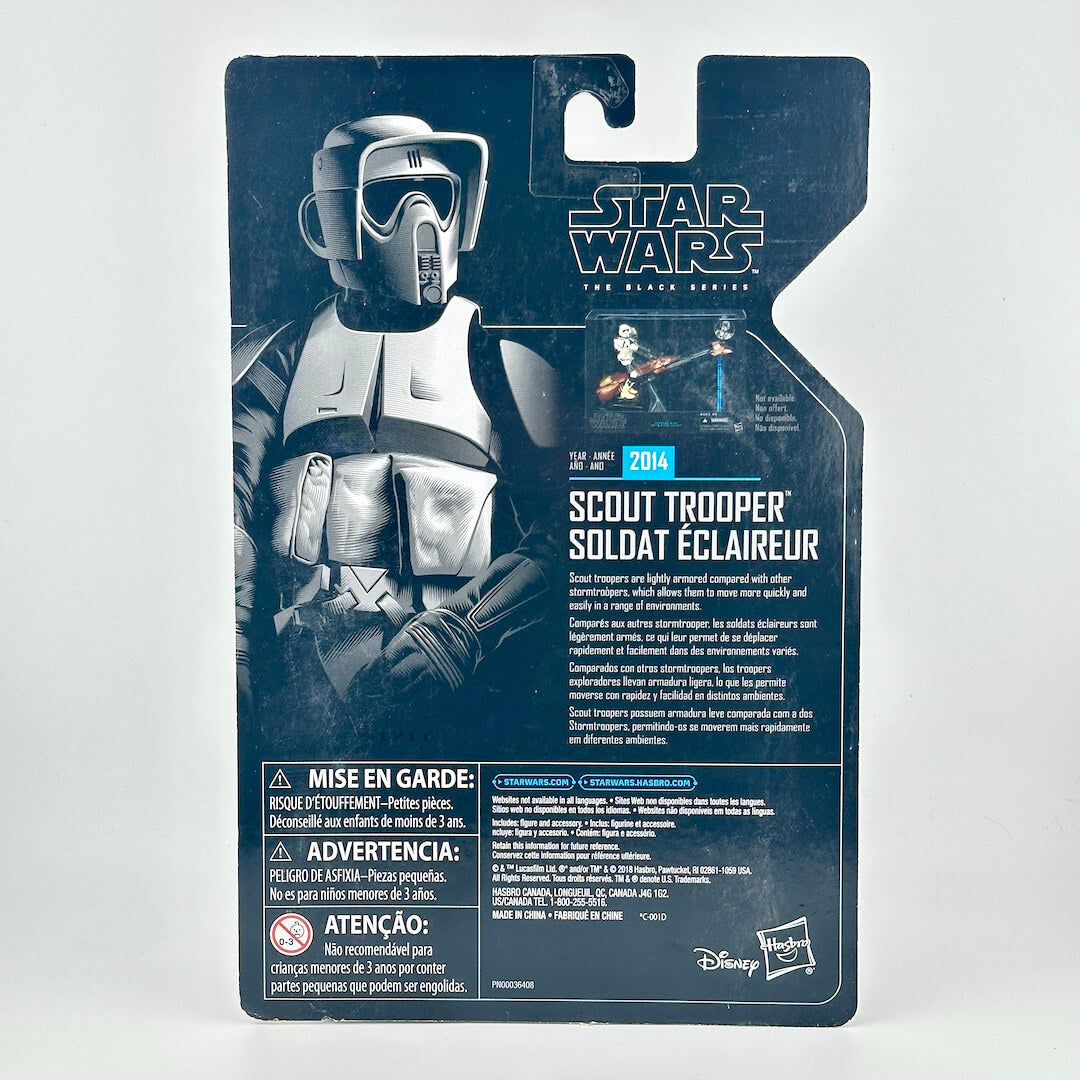 Scout Trooper action figure in its original blister packaging, featuring character artwork and product details.