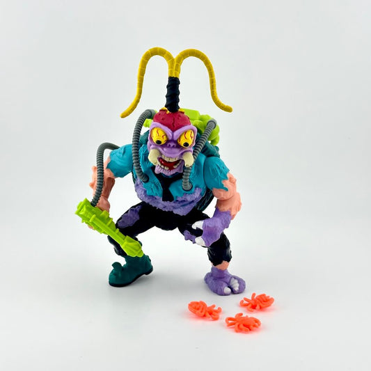TMNT action figure with accessories on white background. 
