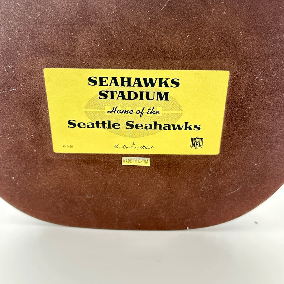 Brown base with a yellow label reading 'Seahawks Stadium, Home of the Seattle Seahawks' on a white background.