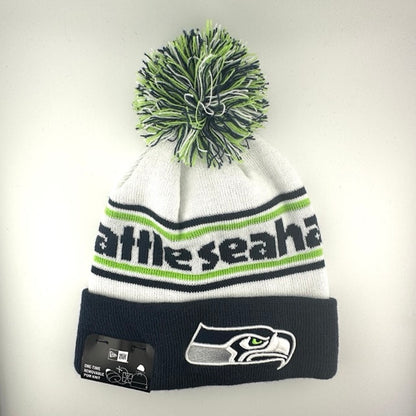White knit cap with green/navy stripes around navy team name, Seahawks logo in center of navy cuff & green/navy/white pom