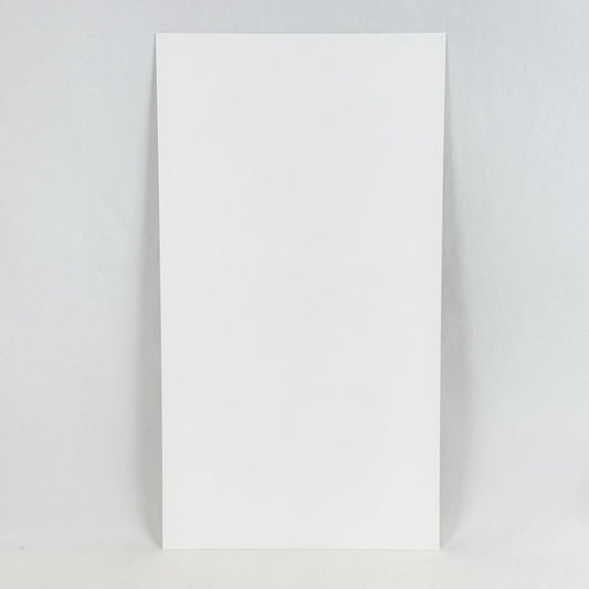 Back view of print showing blank white rectangle pictured on white background. 