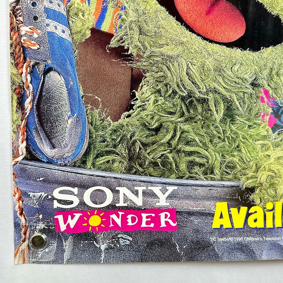 Close-up of a shoe with 'Sony Wonder' branding on a textured surface.