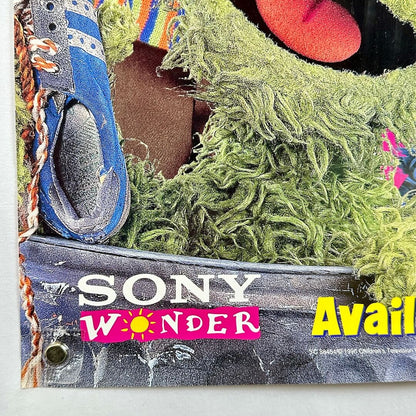 Close-up of a shoe with 'Sony Wonder' branding on a textured surface.