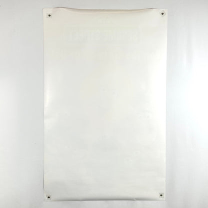 Backside of poster showing no damage to face and some edge wear throughout. 