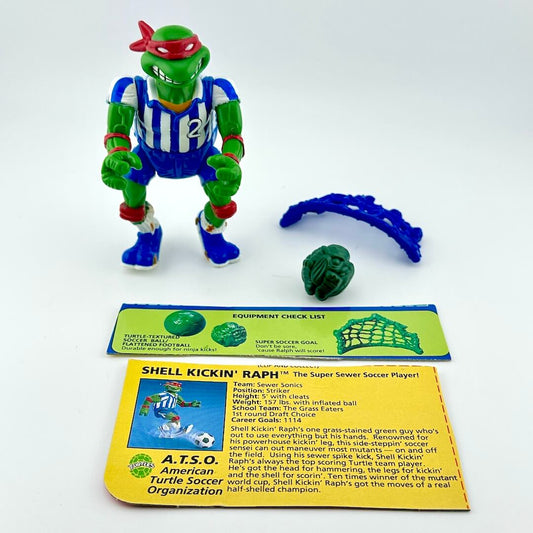 TMNT action figure with accessories and character card against white background. 