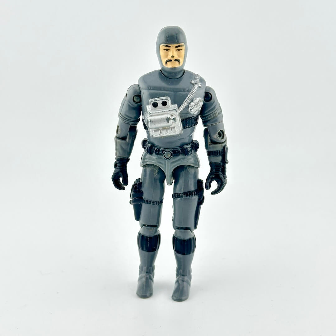 GI Joe action figure in gray wetsuit with black and silver accents photographed on white background. 