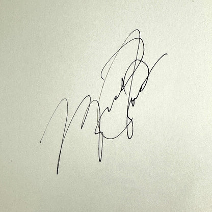 Close up of Michael Jordan signature against beige background. 