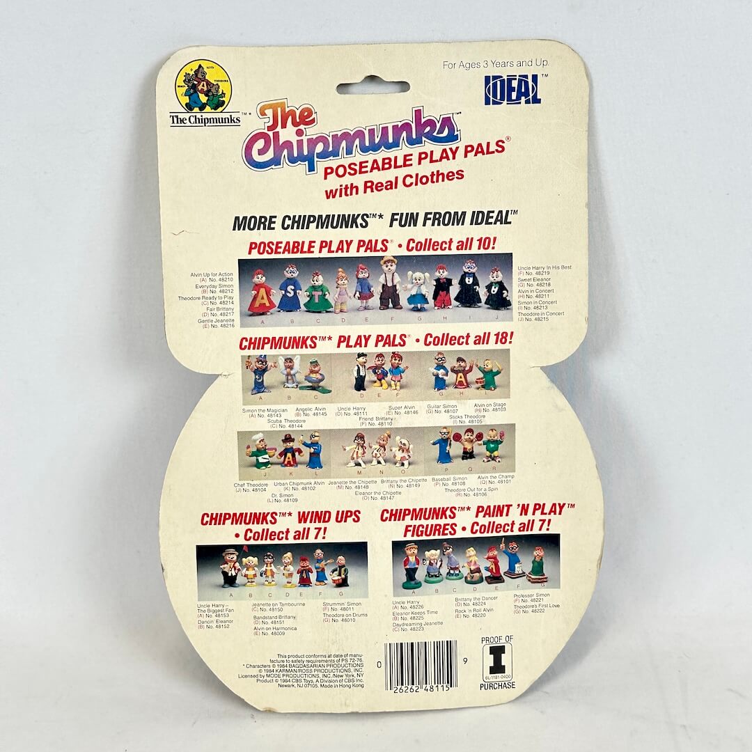 Vintage packaging for 'The Chipmunks' poseable play pals with real clothes on a light gray background.
