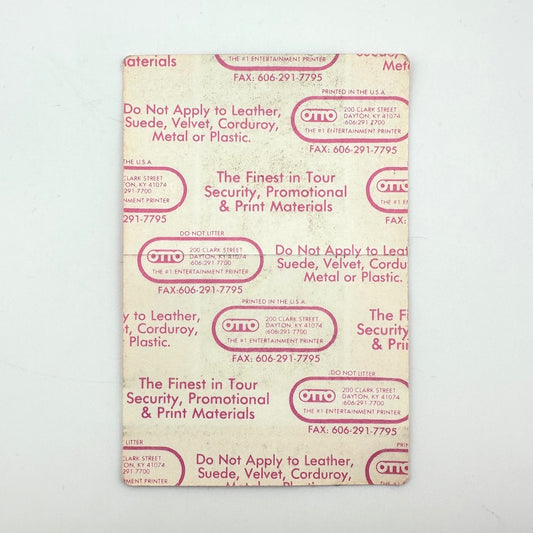 Backside of pass showing intact paper backing and mint condition. 
