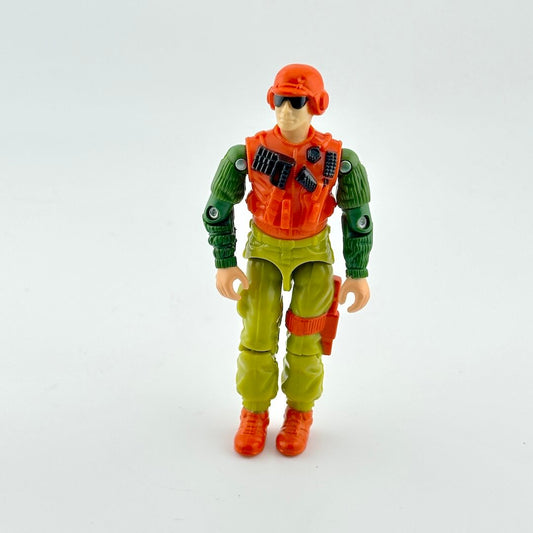Toy figure in green and orange outfit with helmet on a white background