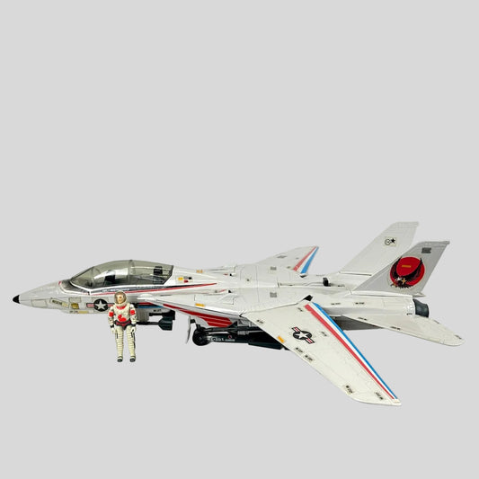 Model of a fighter jet with a figure on a white background