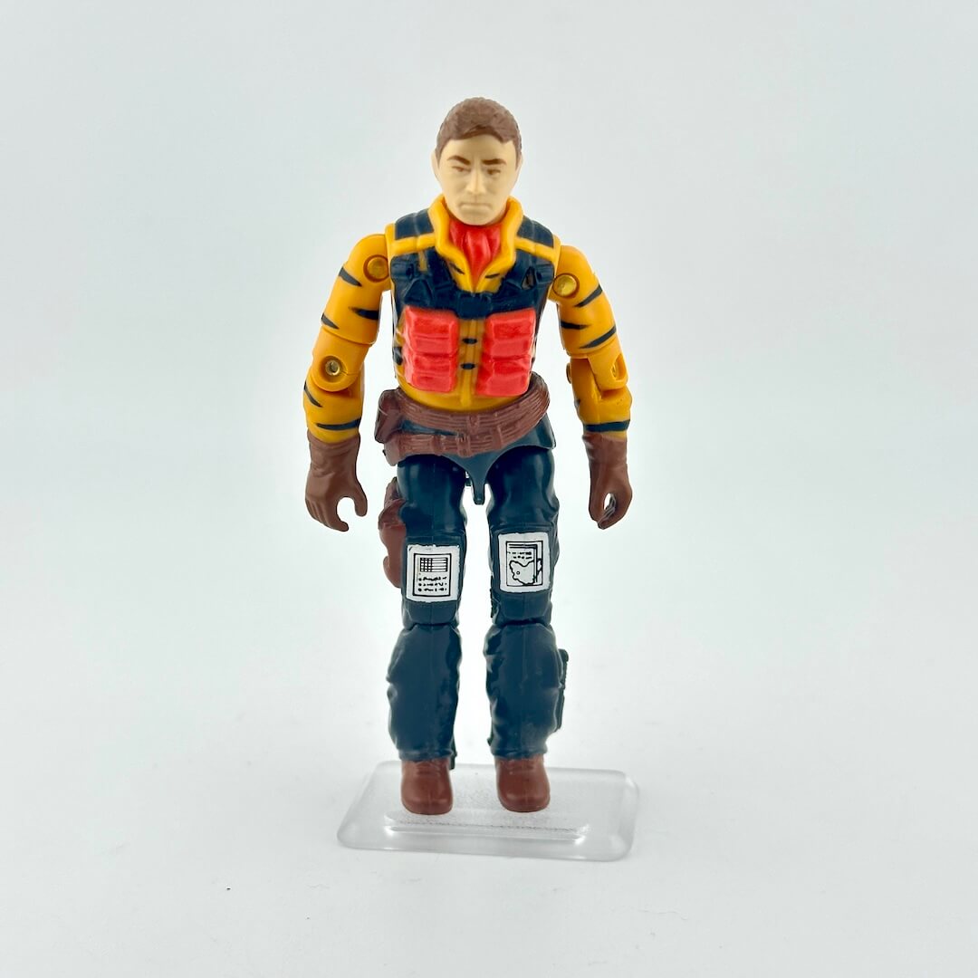 Action figure in colorful outfit on a white background