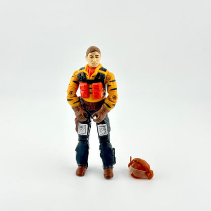 Toy figure of a character in a colorful outfit with a helmet on a white background