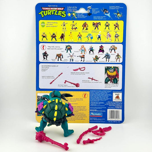 TMNT turtle action figure with accessories and card back on white background.