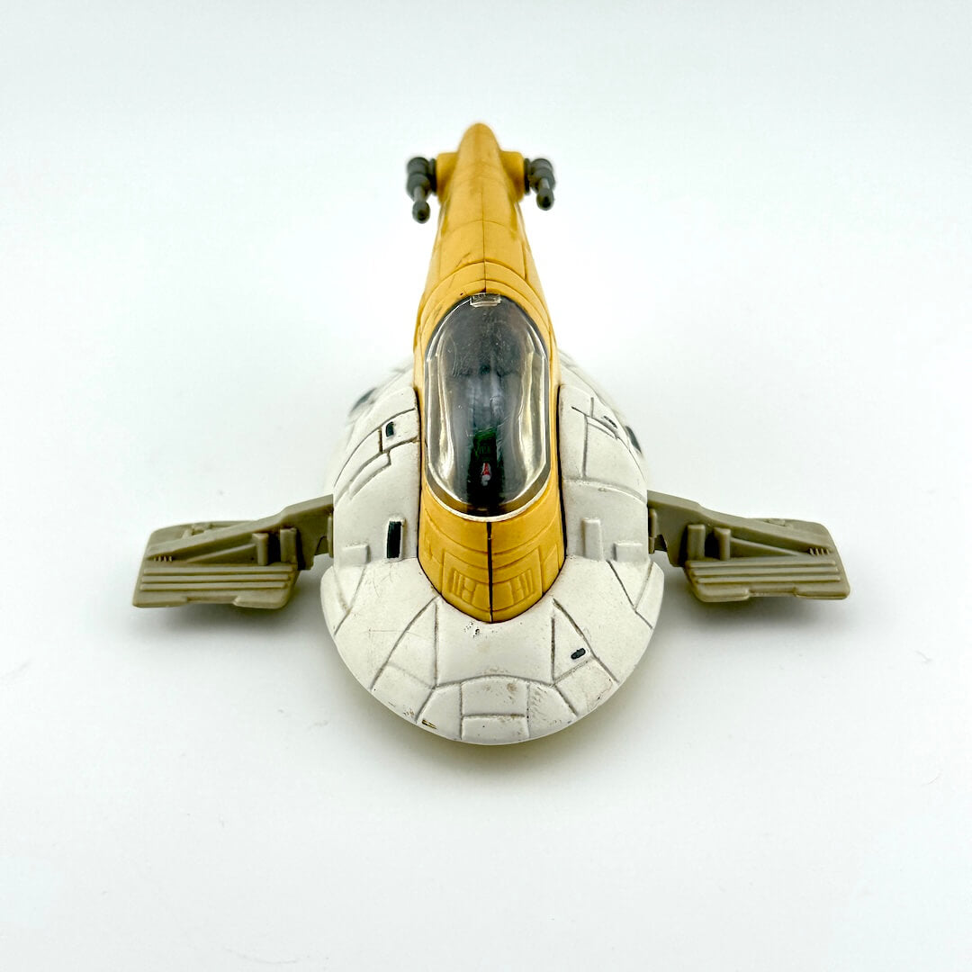 Diecast model of a spaceship of Boba Fett's Slave 1 on a white background