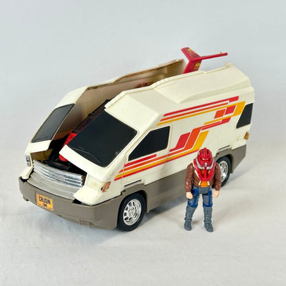 A vintage toy vehicle set featuring a white van with red and orange graphics, an open hood, a red tail lift, and a small action figure.