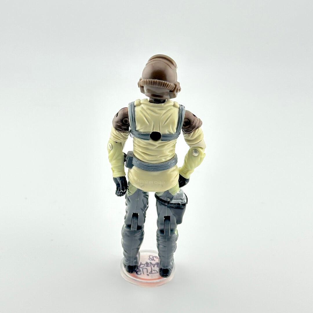 G.I. Joe action figure in flight suit against white background.