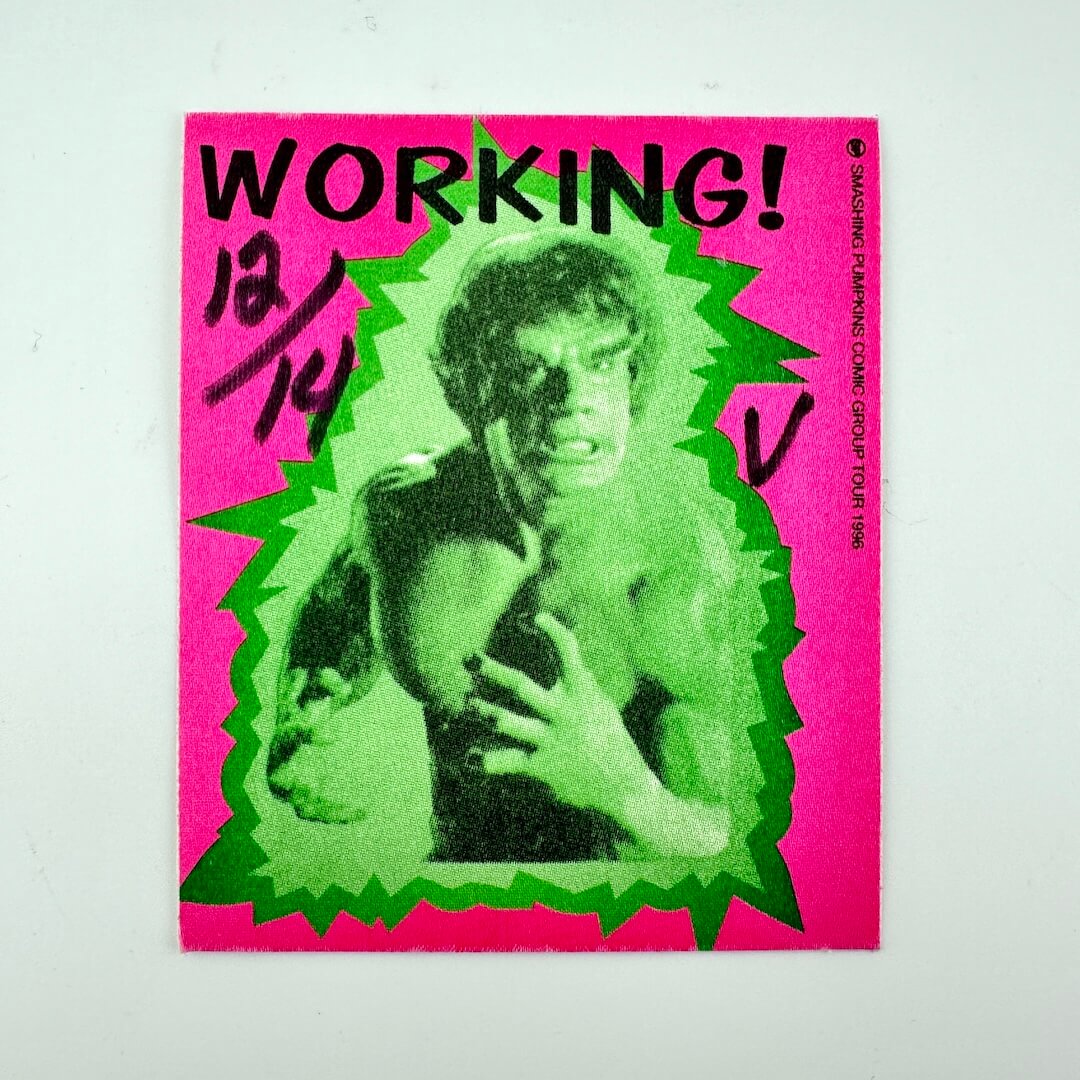 Pink fabric pass with green Hulk and black text against white background. 