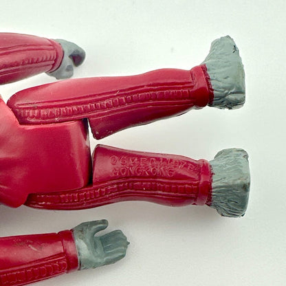 Close-up of back of figure's legs to show COO and copyright information.