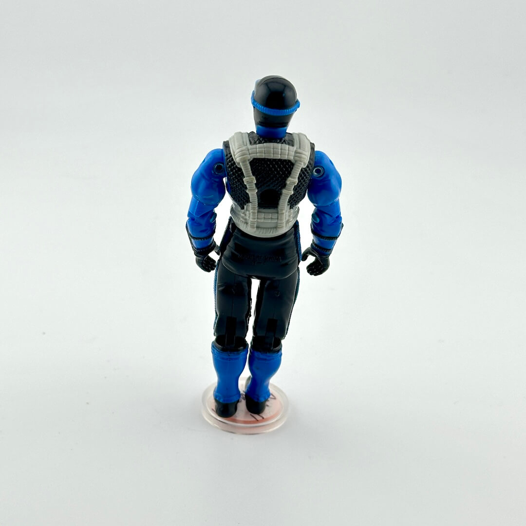 Action figure in blue and gray outfit on a white background