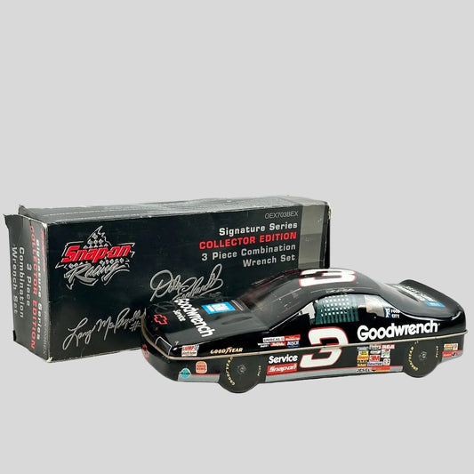 Model race car with 'Goodwrench' branding next to a collector's box on a light gray background