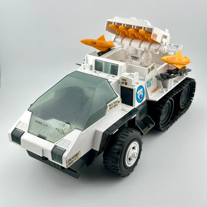 Toy vehicle with rocket boosters on a gray background
