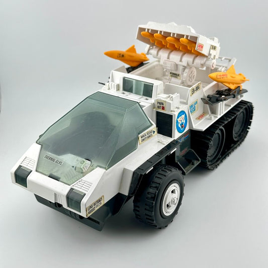 Toy vehicle with rocket boosters on a gray background