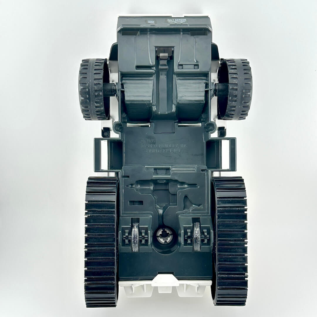 Underside view of toy vehicle to show manufacturing information. 