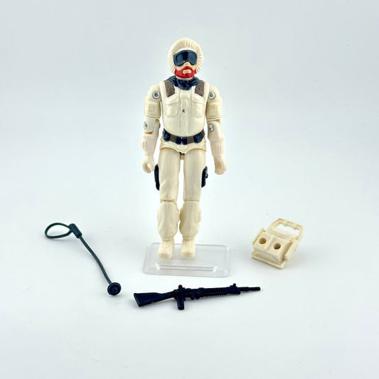 Action figure in a white suit with accessories on a light gray background