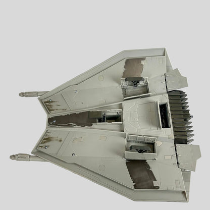 Underside view of snowspeeder replica from Star Wars to show landing gears and open compartment. 